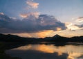 Silhouette mountain and river in twilight sunset